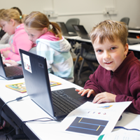 Children participating in coding activity